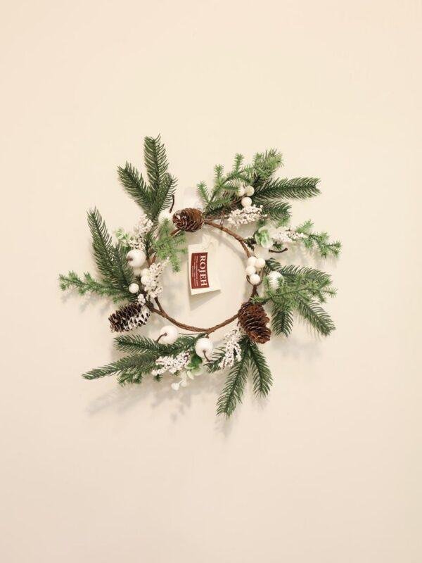 Welcome the holiday season with the Rojeh Christmas Wreath Collection. Beautifully designed to add a festive touch to your front door, walls, windows, fireplace, or any indoor space. Featuring rich greenery and carefully arranged Christmas details, each wreath brings warmth and seasonal charm to your home. Available in a variety of sizes, styles, and colors to complement both traditional and modern Christmas décor. Explore our collection of Christmas wreaths, holiday wreaths, front door wreaths, decorative wreaths, artificial wreaths, and Christmas decorations at Rojeh Store, Jordan.