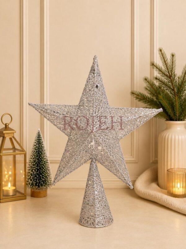 Christmas Star Tree Topper Complete your Christmas tree with a timeless finishing touch. This elegant star tree topper adds festive charm and creates a beautiful focal point for your holiday décor. Designed to complement both classic and contemporary decorating styles, it’s the perfect finishing accent for any Christmas tree. Features: * Elegant star design * Lightweight and easy to place * Fits most Christmas trees * Complements a variety of decorating styles * Perfect for home, office, and holiday displays
