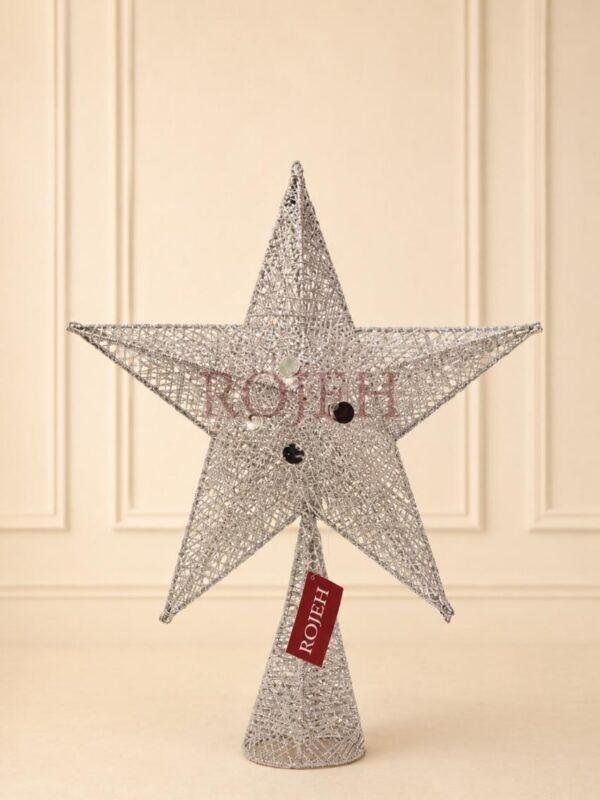 Christmas Star Tree Topper Complete your Christmas tree with a timeless finishing touch. This elegant star tree topper adds festive charm and creates a beautiful focal point for your holiday décor. Designed to complement both classic and contemporary decorating styles, it’s the perfect finishing accent for any Christmas tree. Features: * Elegant star design * Lightweight and easy to place * Fits most Christmas trees * Complements a variety of decorating styles * Perfect for home, office, and holiday displays