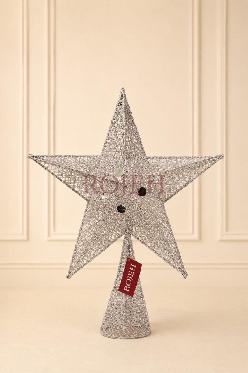 WhatsApp Image 2026-07-25 at 5.31.24 PM (3) Christmas Star Tree Topper Complete your Christmas tree with a timeless finishing touch. This elegant star tree topper adds festive charm and creates a beautiful focal point for your holiday décor. Designed to complement both classic and contemporary decorating styles, it’s the perfect finishing accent for any Christmas tree. Features: * Elegant star design * Lightweight and easy to place * Fits most Christmas trees * Complements a variety of decorating styles * Perfect for home, office, and holiday displays