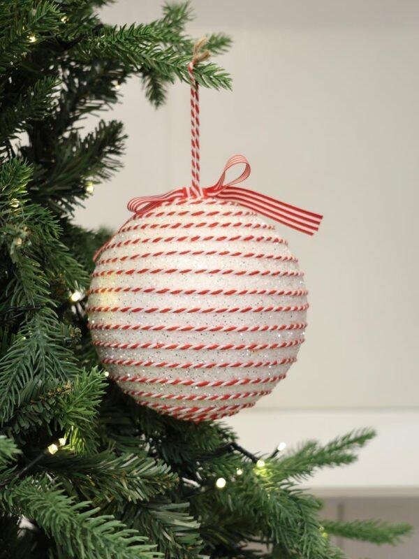 Add a sweet and playful touch to your Christmas décor with our Candy Christmas Ornaments. Inspired by classic holiday sweets and festive candy colors, these ornaments feature charming details, sparkling finishes, and cheerful designs that bring a fun Christmas atmosphere to any setting. Perfect for decorating Christmas trees, wreaths, garlands, centerpieces, and festive displays. Available in a variety of candy-inspired shapes, styles, colors, and designs to create a coordinated or colorful holiday theme. A delightful addition to Christmas décor in Jordan, ideal for homes, shops, restaurants, hotels, and seasonal displays. Rojeh Store, Al Fuheis, Amman, Jordan.
