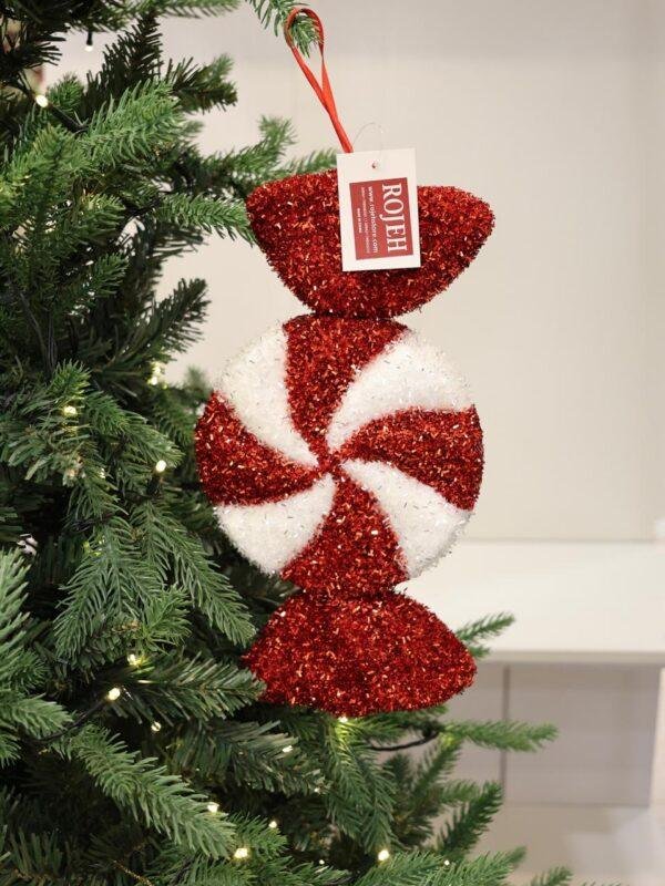 Add a sweet and playful touch to your Christmas décor with our Candy Christmas Ornaments. Inspired by classic holiday sweets and festive candy colors, these ornaments feature charming details, sparkling finishes, and cheerful designs that bring a fun Christmas atmosphere to any setting. Perfect for decorating Christmas trees, wreaths, garlands, centerpieces, and festive displays. Available in a variety of candy-inspired shapes, styles, colors, and designs to create a coordinated or colorful holiday theme. A delightful addition to Christmas décor in Jordan, ideal for homes, shops, restaurants, hotels, and seasonal displays. Rojeh Store, Al Fuheis, Amman, Jordan.