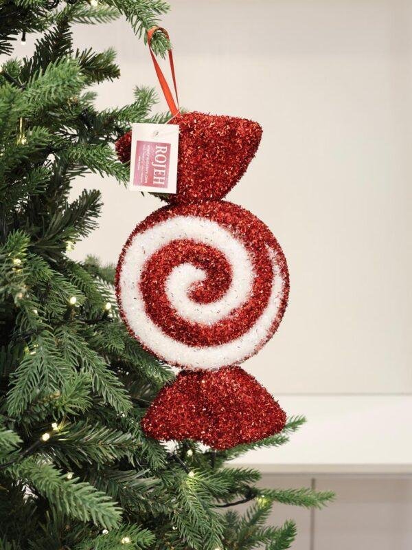 Add a sweet and playful touch to your Christmas décor with our Candy Christmas Ornaments. Inspired by classic holiday sweets and festive candy colors, these ornaments feature charming details, sparkling finishes, and cheerful designs that bring a fun Christmas atmosphere to any setting. Perfect for decorating Christmas trees, wreaths, garlands, centerpieces, and festive displays. Available in a variety of candy-inspired shapes, styles, colors, and designs to create a coordinated or colorful holiday theme. A delightful addition to Christmas décor in Jordan, ideal for homes, shops, restaurants, hotels, and seasonal displays. Rojeh Store, Al Fuheis, Amman, Jordan.