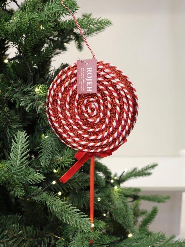 Add a sweet and playful touch to your Christmas décor with our Candy Christmas Ornaments. Inspired by classic holiday sweets and festive candy colors, these ornaments feature charming details, sparkling finishes, and cheerful designs that bring a fun Christmas atmosphere to any setting. Perfect for decorating Christmas trees, wreaths, garlands, centerpieces, and festive displays. Available in a variety of candy-inspired shapes, styles, colors, and designs to create a coordinated or colorful holiday theme. A delightful addition to Christmas décor in Jordan, ideal for homes, shops, restaurants, hotels, and seasonal displays. Rojeh Store, Al Fuheis, Amman, Jordan.