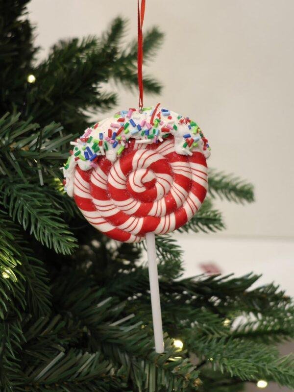 Add a sweet and playful touch to your Christmas décor with our Candy Christmas Ornaments. Inspired by classic holiday sweets and festive candy colors, these ornaments feature charming details, sparkling finishes, and cheerful designs that bring a fun Christmas atmosphere to any setting. Perfect for decorating Christmas trees, wreaths, garlands, centerpieces, and festive displays. Available in a variety of candy-inspired shapes, styles, colors, and designs to create a coordinated or colorful holiday theme. A delightful addition to Christmas décor in Jordan, ideal for homes, shops, restaurants, hotels, and seasonal displays. Rojeh Store, Al Fuheis, Amman, Jordan.